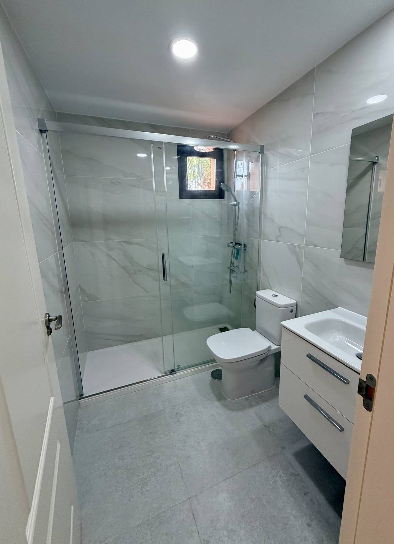 Upstairs bathroom with walk-in shower